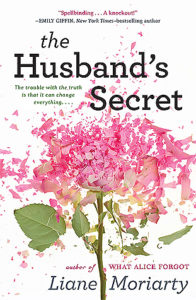 The Husband's Secret book cover: white background with pink rose shattering into pieces.