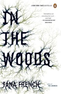 In the Woods cover image: white background with the title letters having tree branches growing out of them