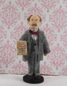 a handpainted and sewn standing doll of Agatha Christie's character Parker Pyne