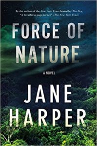 Force of Nature cover image: aerial view of green forest with title letters foggy through sky