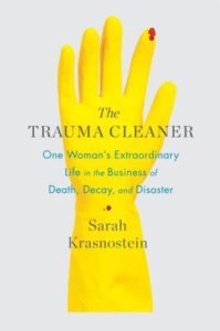 The Trauma Cleaner cover image: a yellow latex glove with a spot of blood on the tip of the index finger
