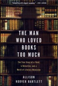 cover image: silhouette of a man in hate in front of bookshelves