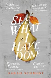 cover image: half a pear, flesh up, with flies on a grey background