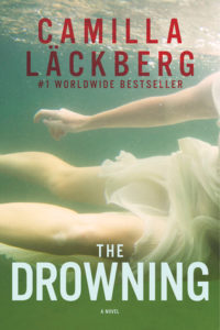 cover image: white woman in white dress floating in water zoomed in from waist to shins