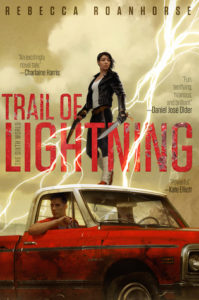 cover image: a young native american woman in a leather jacket holding a sword standing on top of a pickup truck with a young man inside and lightning in the sky behind