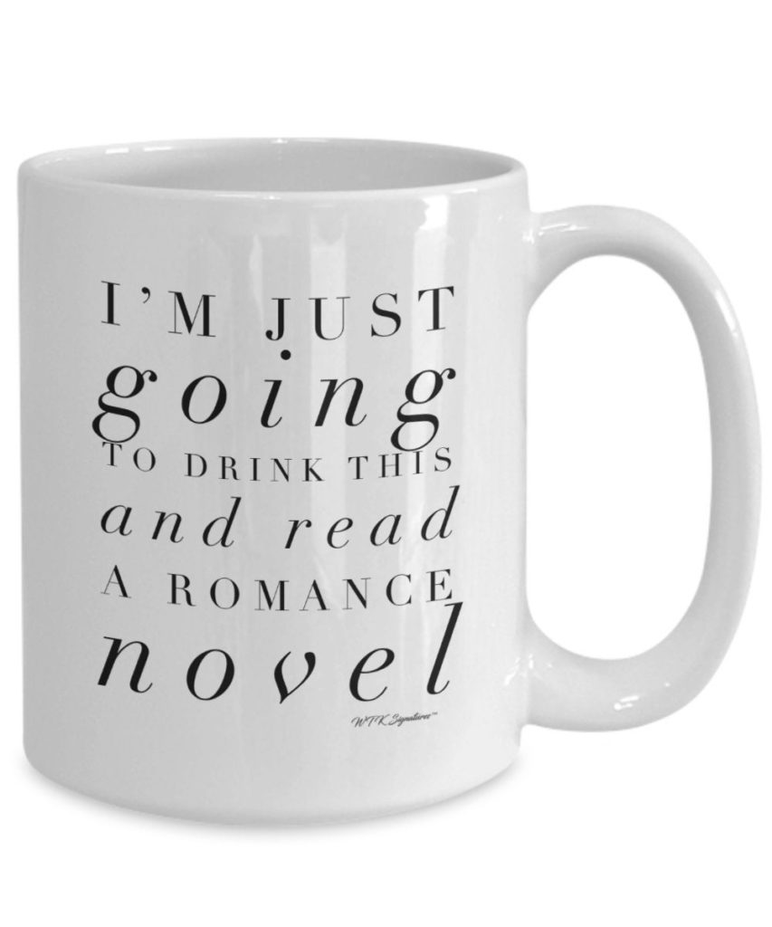 Photo of white mug that says "I'm just going to drink this and read a romance novel"