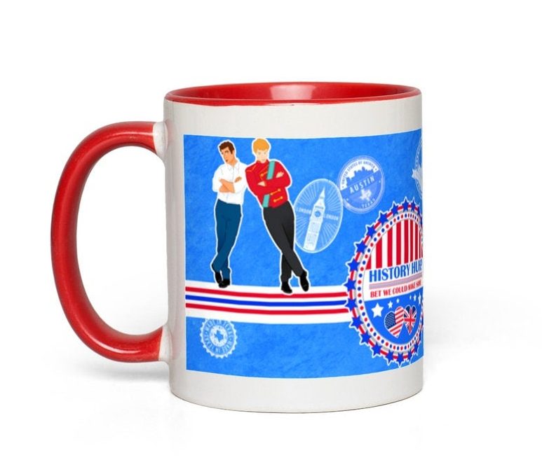 photograph of coffee mug with illustration of Alex and Henry from Red, White and Royal Blue