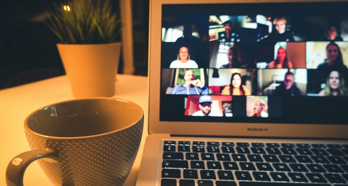 image of a laptop screen showing a group video call https://unsplash.com/photos/fRGoTJFQAHM