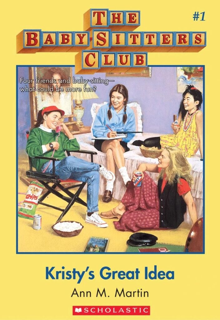 cover of The Baby-Sitters Club #: Kristy's Great Idea, showing four young girls in a bedroom with assorted snacks and soda. One of the girls is on a pink corded phone, another is writing in a notebook