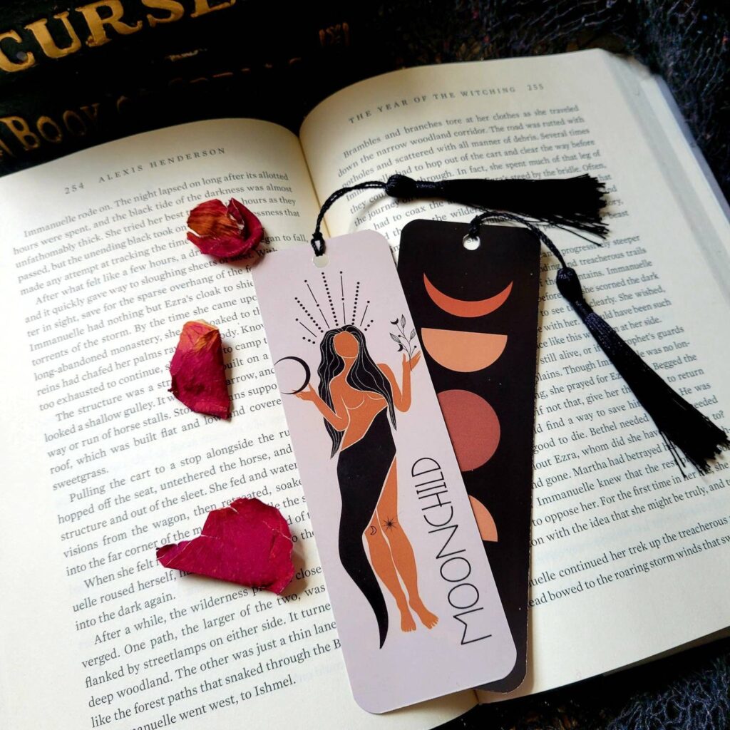 bookmark with Black woman on one side and phases of the moon on the other