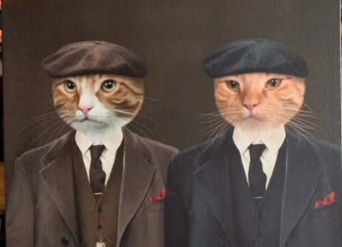 photoshopped image of two orange cats wearing gangster suits; photo by Liberty Hardy
