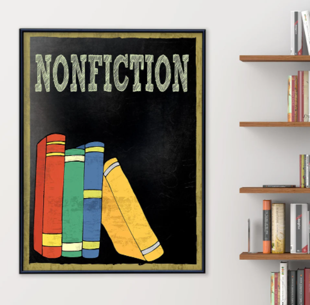 black sign with a stack of primary-colored books and the word nonfiction