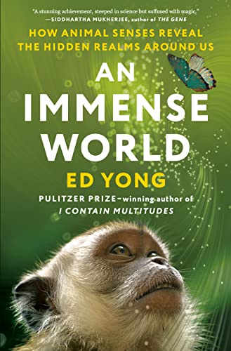 cover of An Immense World by Ed Yong; photo of a monkey looking up at a butterfly