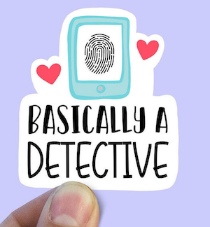 a white vinal sticker that says Basically A Detective below a doodled fingerprint