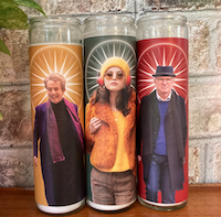 three prayer candles each with an image of a main character from Only Murders in the Building show