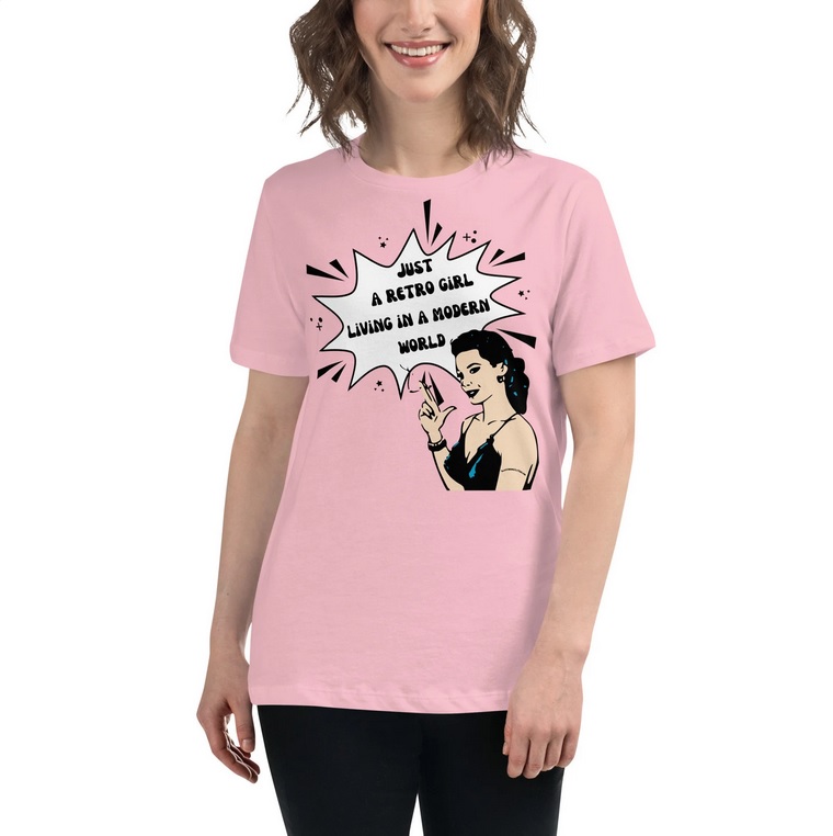 A woman in a pink t-shirt with a comic-book inspired drawing of a woman on it