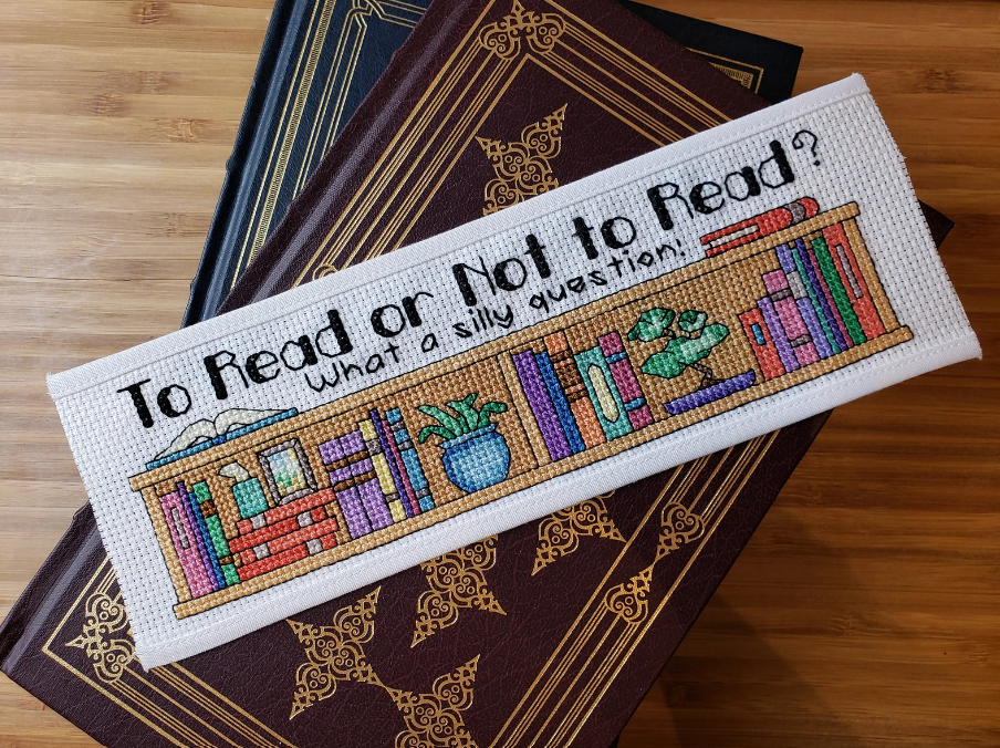 xross stitch bookmark that says "to read or not to read, what a silly question."