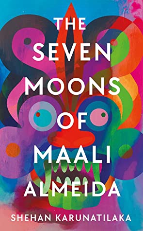 cover of The Seven Moons of Maali Almeida by Shehan Karunatilaka; colorful illustration of a Sri Lankan god