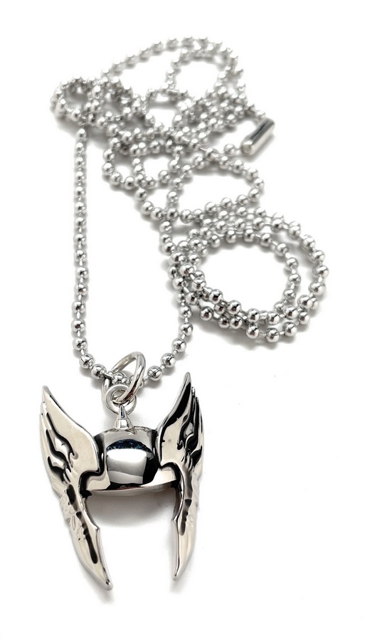 A silver chain necklace with a charm shaped like Thor's winged helmet