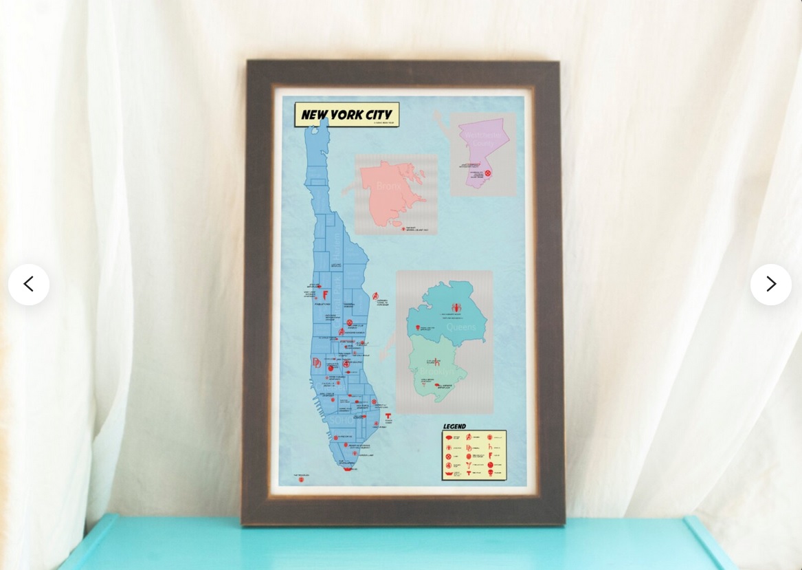 A framed photo of a map of New York highlighting important spots in different comic book universes