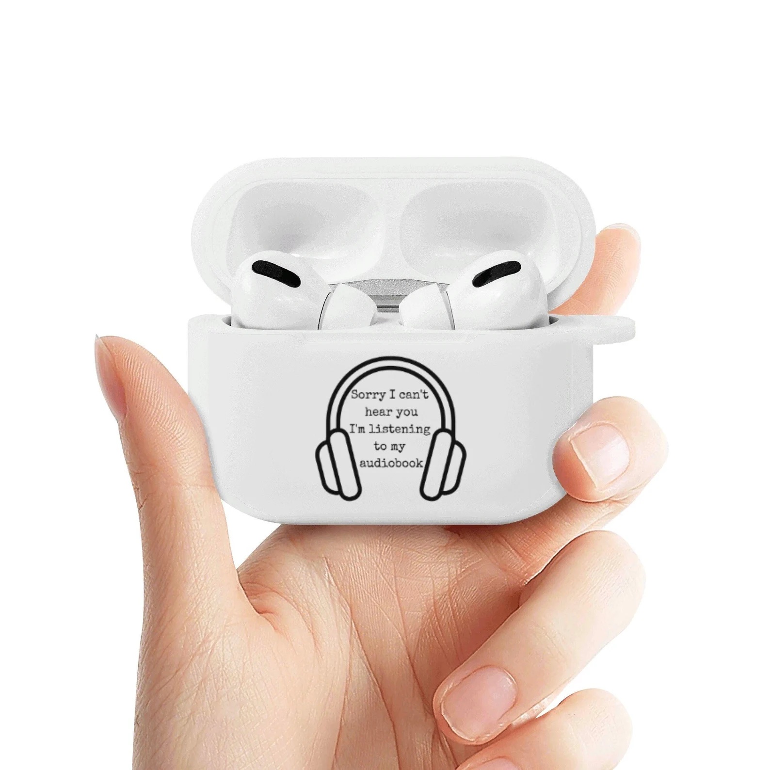 A photo of an AirPods case the says, "I can't hear you. I'm listening to me audiobook."