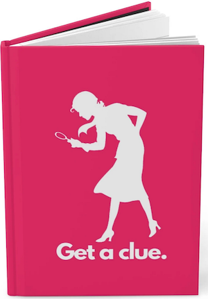 hot pink journal with white silhouete of woman with magnifying glass and text saying "get a clue"