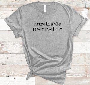 grey tshirt with black text saying "unreliable narrator"