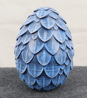 picture of a blue dragon egg dice box