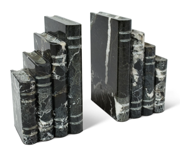 bookends made of black marble ith shite streaks shaped like standing books