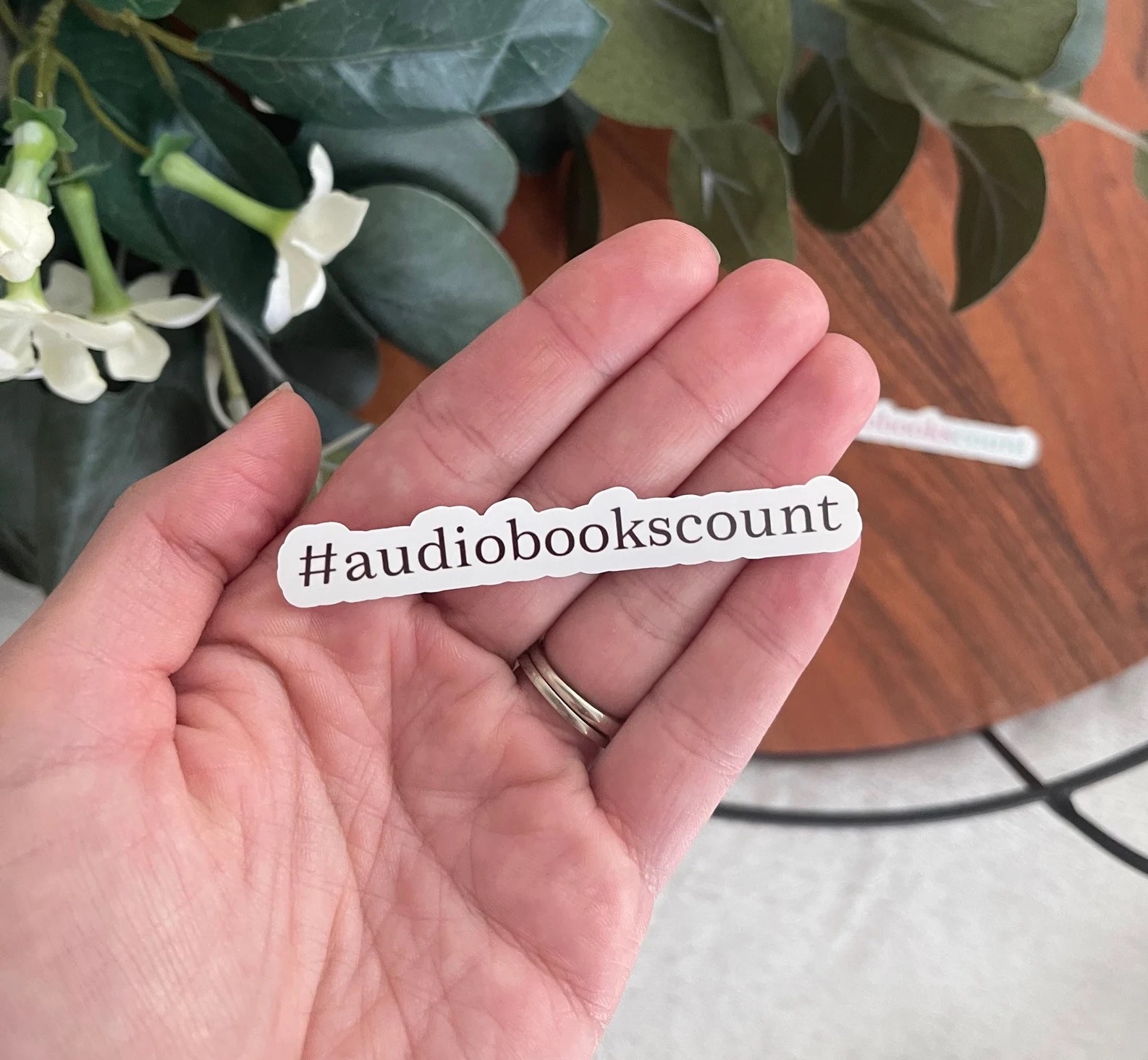 A photo of a sticking that says #AudiobooksCount