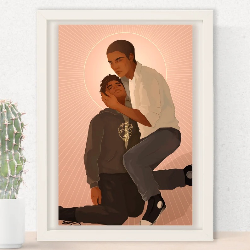 a print of the two teen boys in Cemetery Boys embracing each other