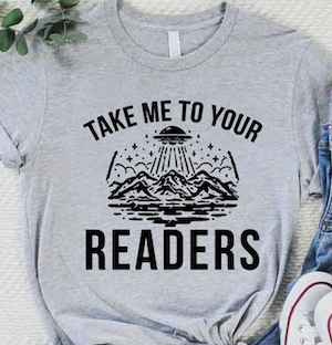 tshirt with an alien ship graphic and the text "take me to your readers"