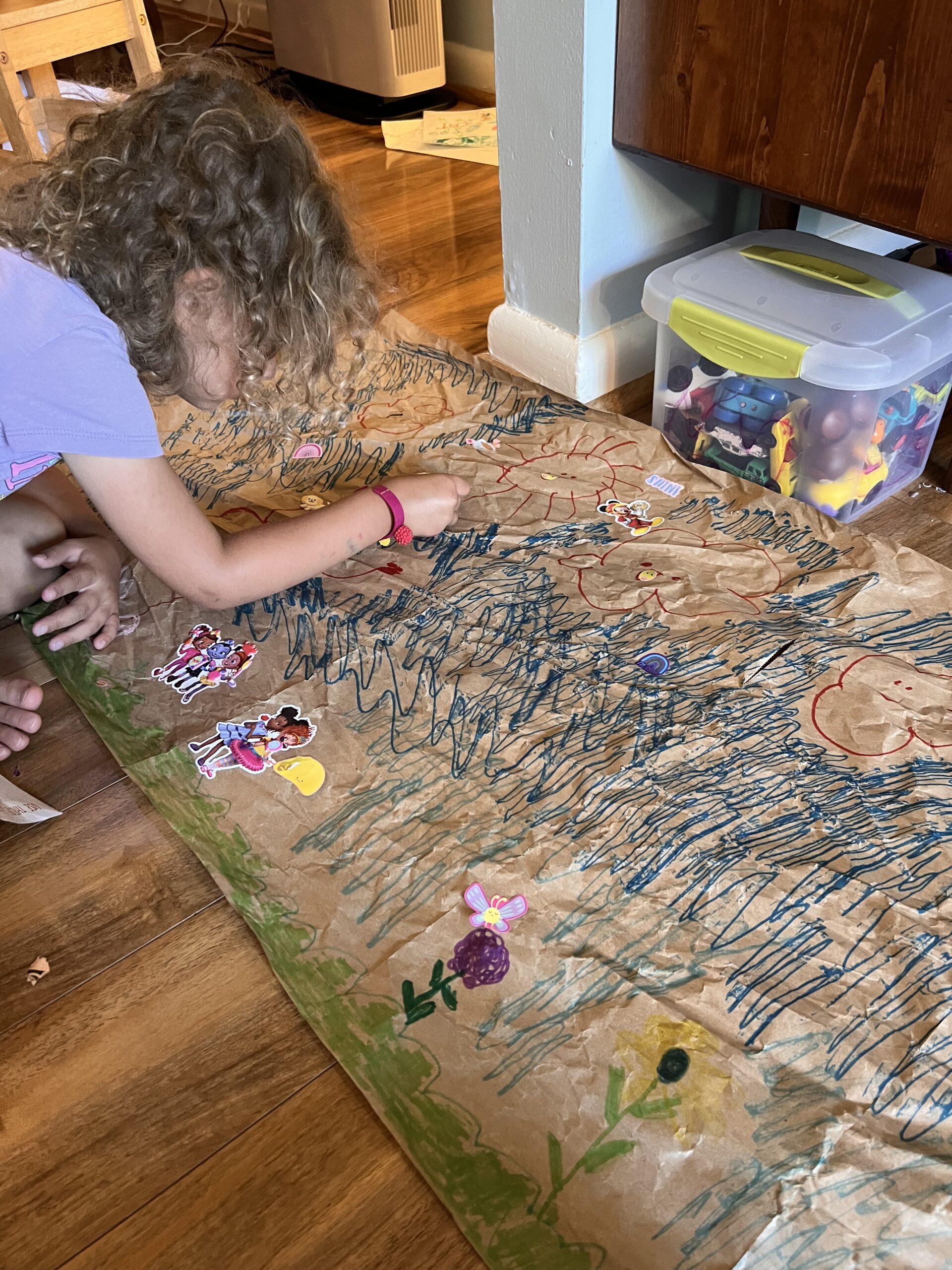 Marian decorating wrapping paper, the kids are all right