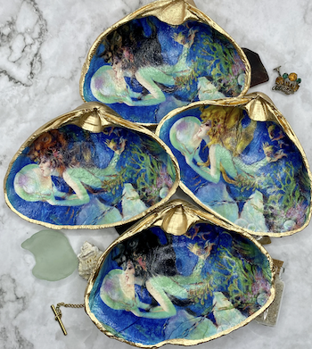 picture of clam shells decorated with mermaids