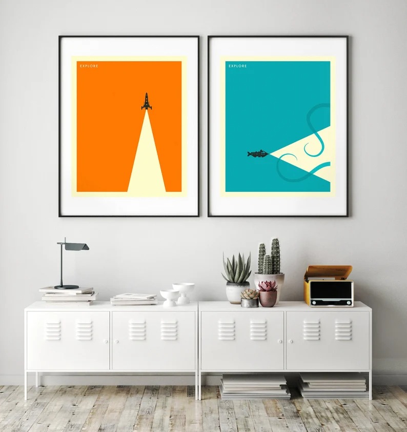 a photo of two minimalist posters showing a spaceship and a submarine