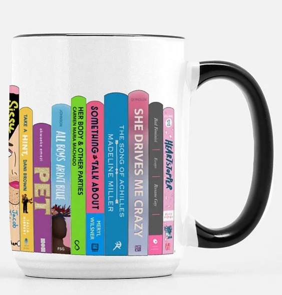 a mug with a painting of queer book spines, including Pet, The Song of Achilles, and Her Body and Other Parties
