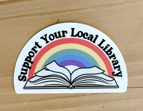 sticker with an open book and a rainbow with the words support your local library