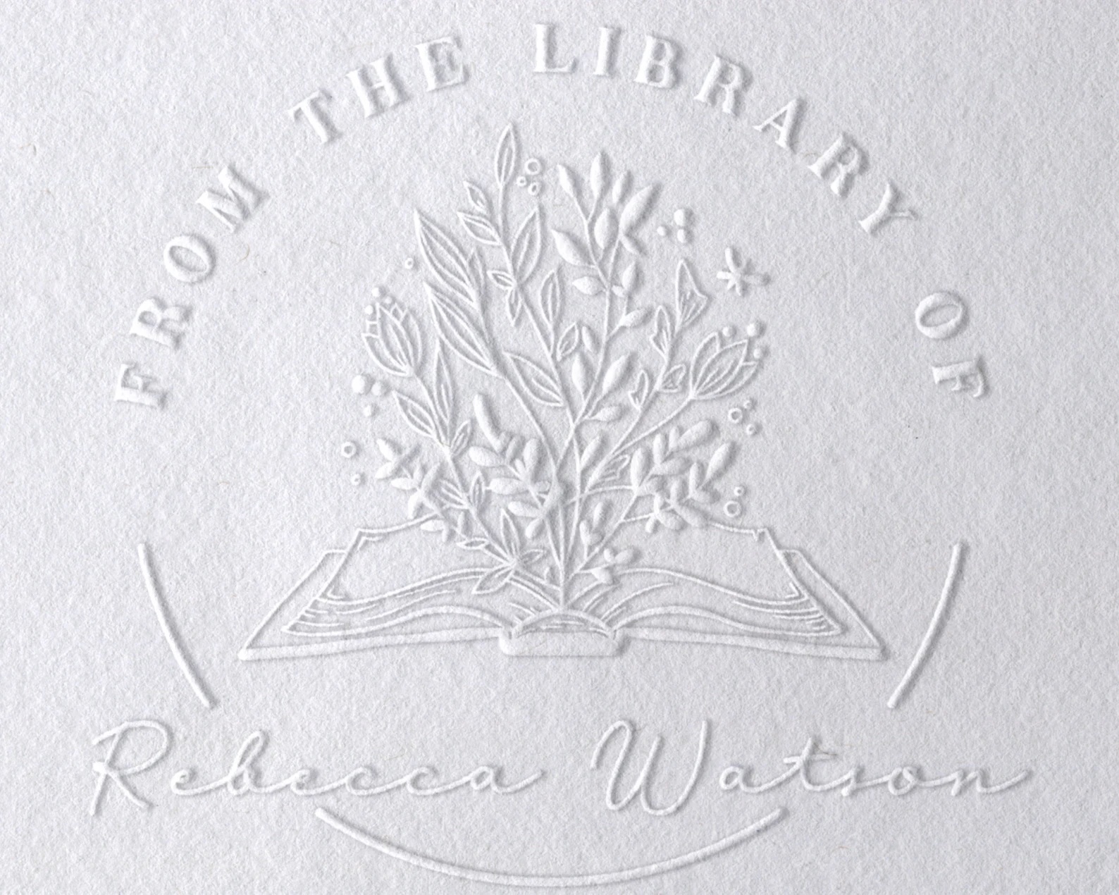 A photo of an embossing on a book page
