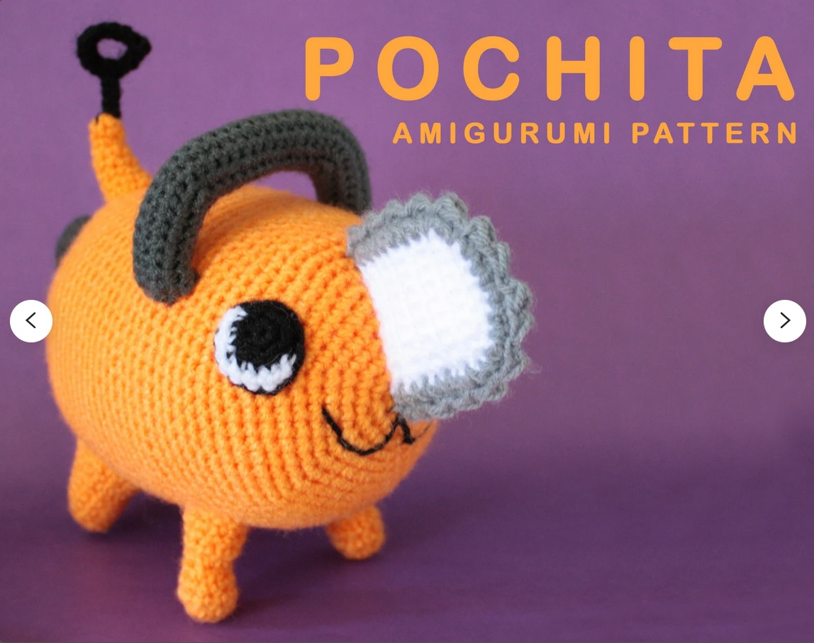 A crocheted plushie of Pochita from Chainsaw Man