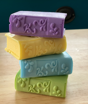 a stack of soap shaped like books