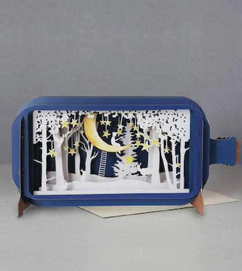Picture of a paper cute scene with a moon in it