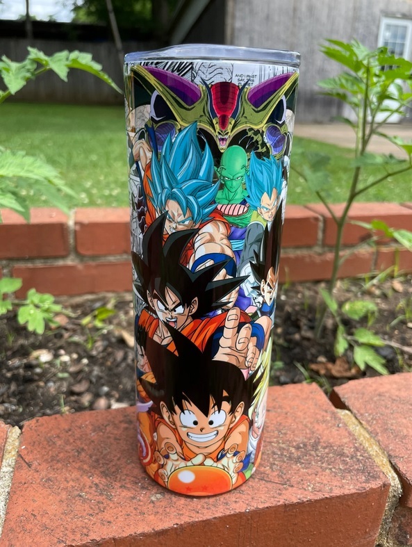 A tumbler covered with images of anime characters