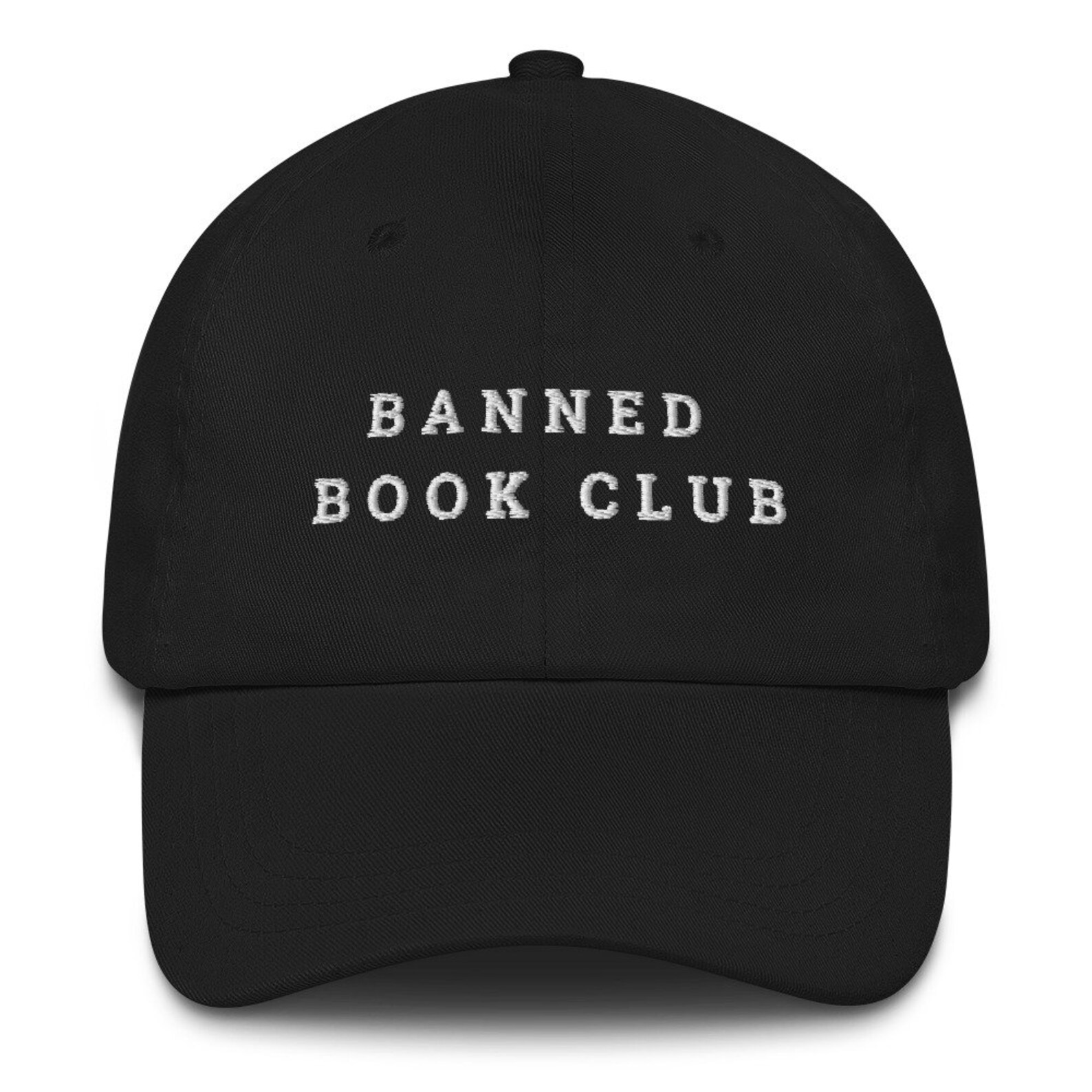 a photo of a black dad hat with "Banned Book Club" on the front in white