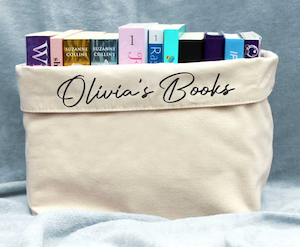 tan cloth bag personalized with name to hold books