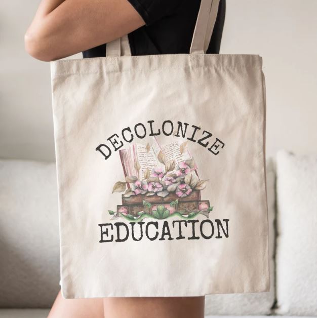 Decolonize Education tote bag by OgokiWild