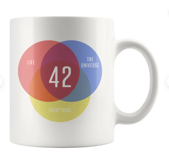 a photo of a mug with a venn diagram of life, the universe, and everything, with 42 in the overlap in the middle