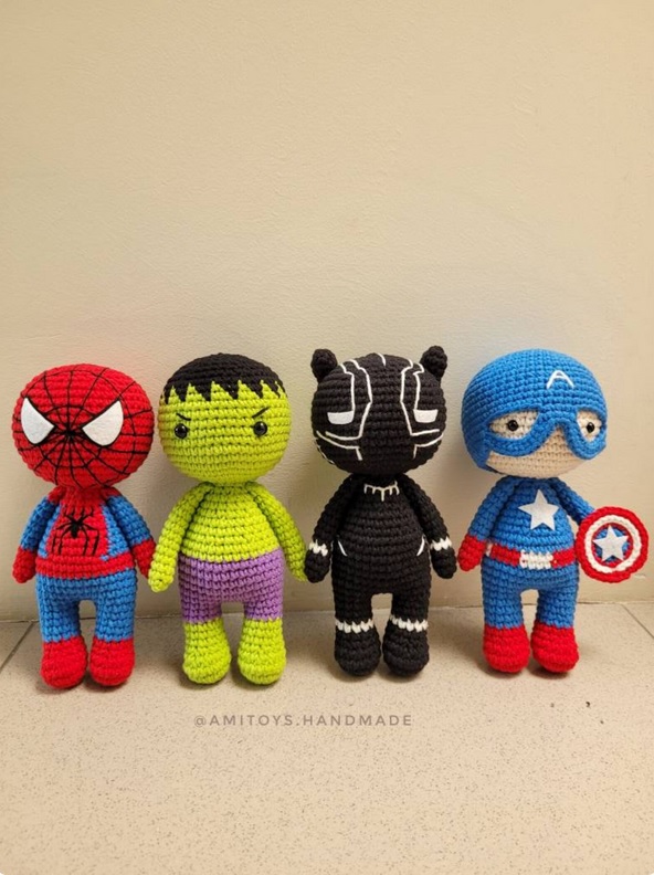 Four crocheted dolls of Spider-Man, Hulk, Black Panther, Captain America