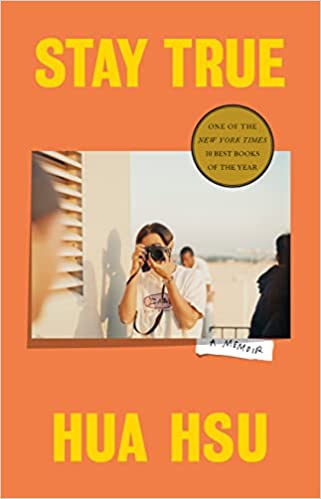 cover of Stay True: A Memoir by Hua Hsu; photo of person holding a camera up to their face and pointing it at the camera