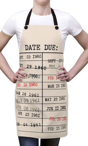 an apron with a library card print