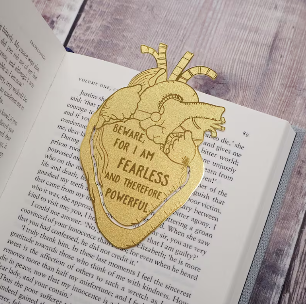 Brass Bookmark in the shape of an anatomical heart featuring a quote from Frankenstein